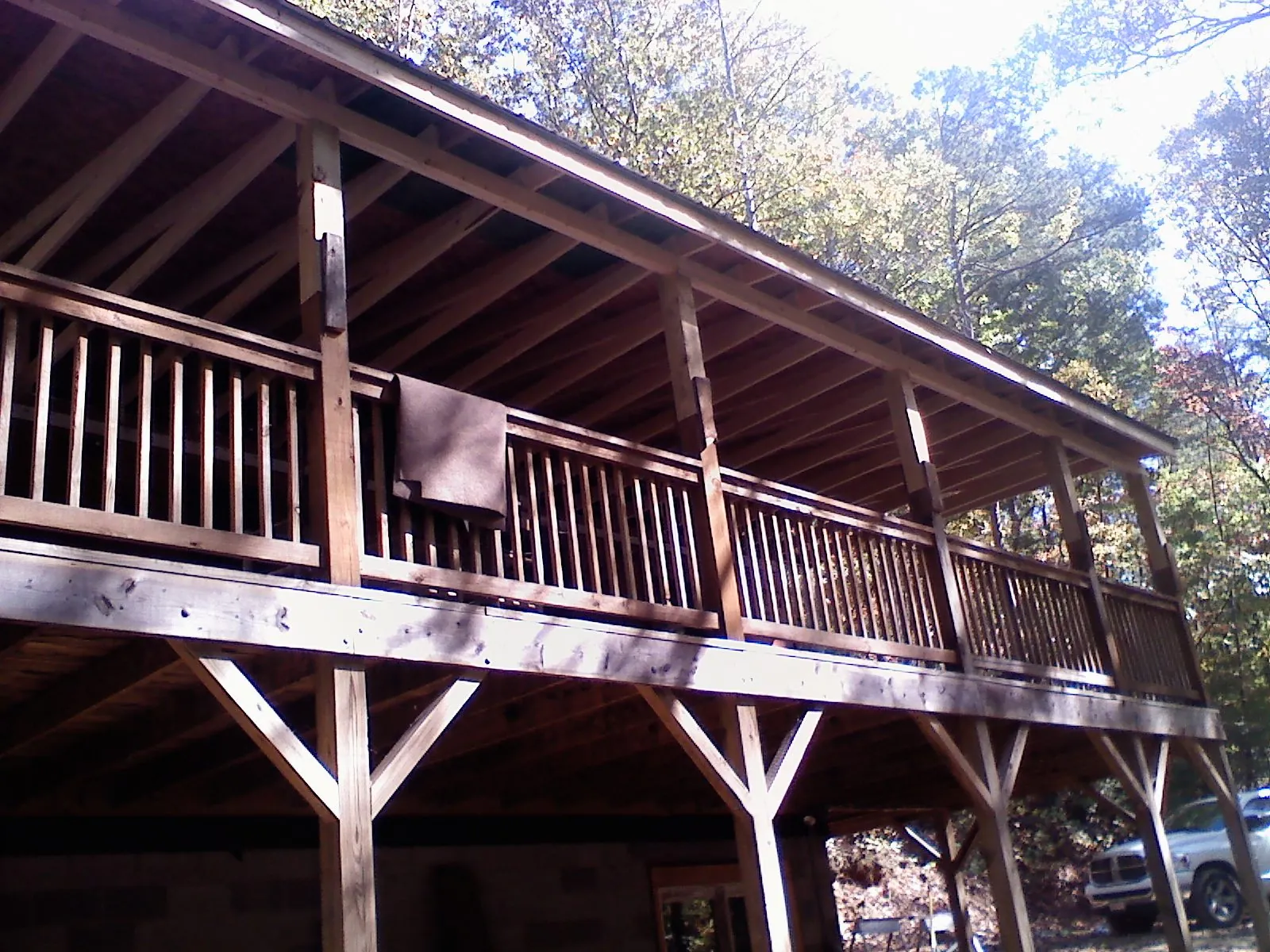 Timber framing under a new elevated porch and deck — Roof Leak Repair in Mc Graw by Roofing Brothers